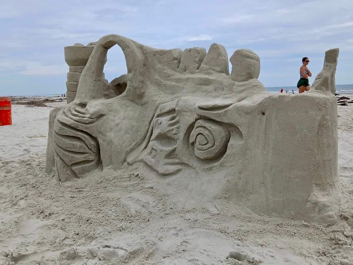 Large detailed sand sculpture by the Sunset Sand Artists at Sunset Beach NC