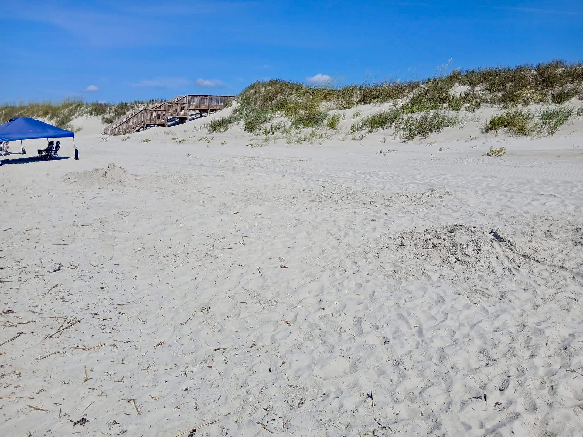 Empty beach at Sunset Beach NC where the Hurricanes sand sculpture once stood